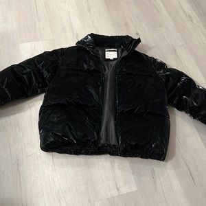 Size Small shiny black puffer jacket in great condition!